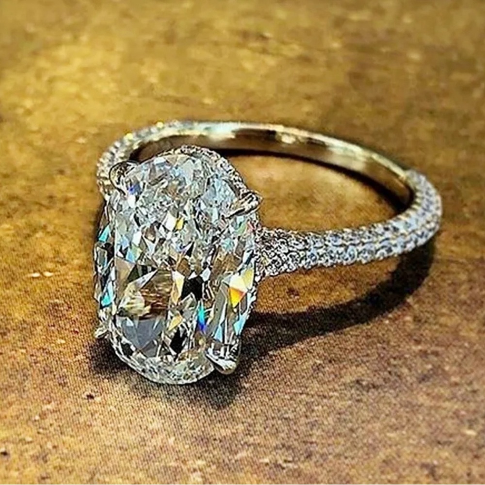 Huitan Gold Band Ring with Clear Oval Crystal